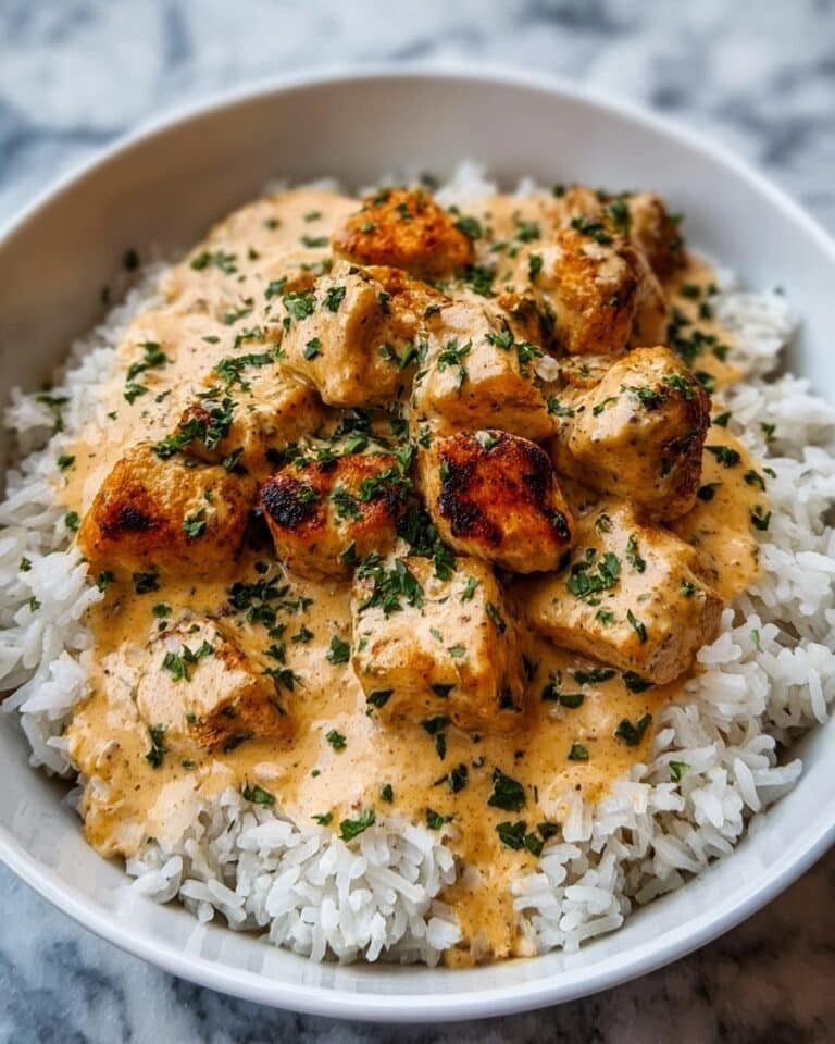 Smothered Chicken in Creamy Parmesan Sauce with Rice Recipe